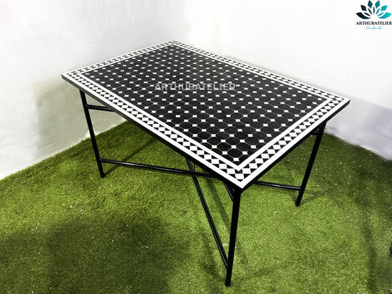 Patio table made from mosaic tiles 100% handmade with black and white colors for outdoor and indoor built with mid century modern styling.